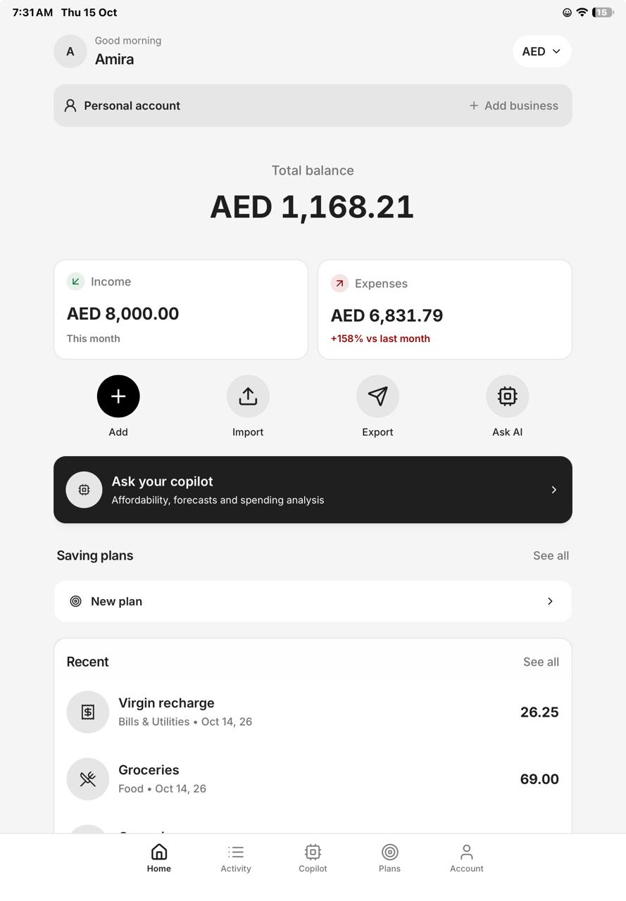 Expenso on iPad showing total balance, income, expenses and copilot access